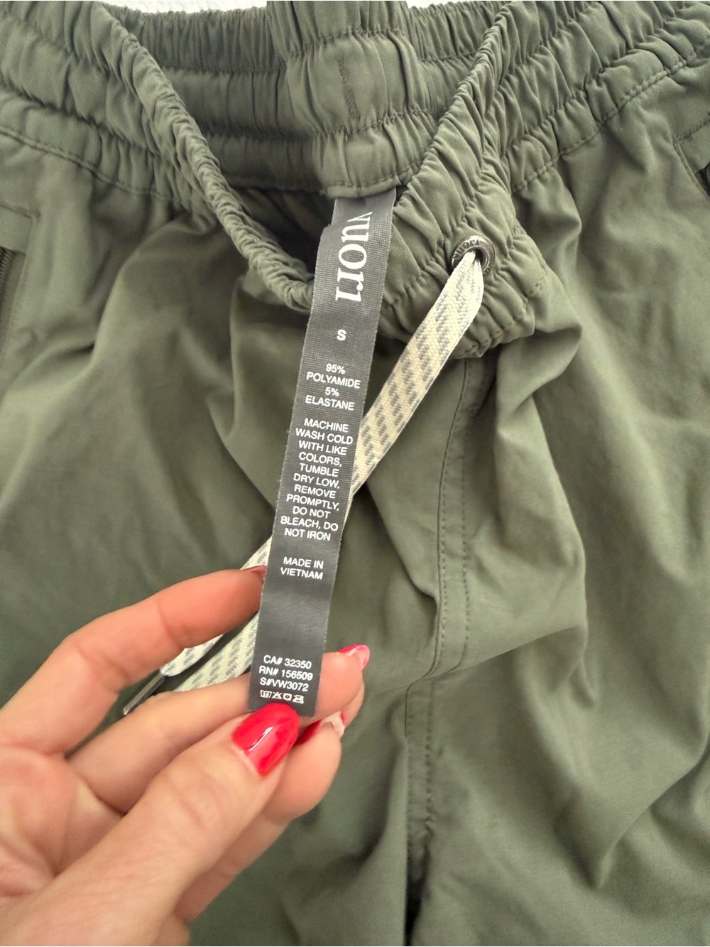 Vuori Olive Green Drawstring Athletic Shorts with Zip Pockets - Picture 2 of 3